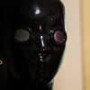 Latex hood with lens